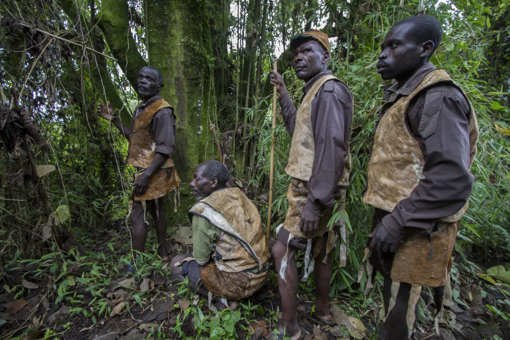 Batwa community member in traditional attire near Queen Elizabeth National Park, Uganda