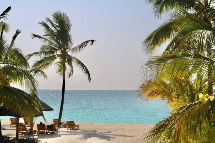 White-sand beach and turquoise water in Zanzibar on the 8 Days Uganda & Zanzibar Luxury Safari & Beach Escape